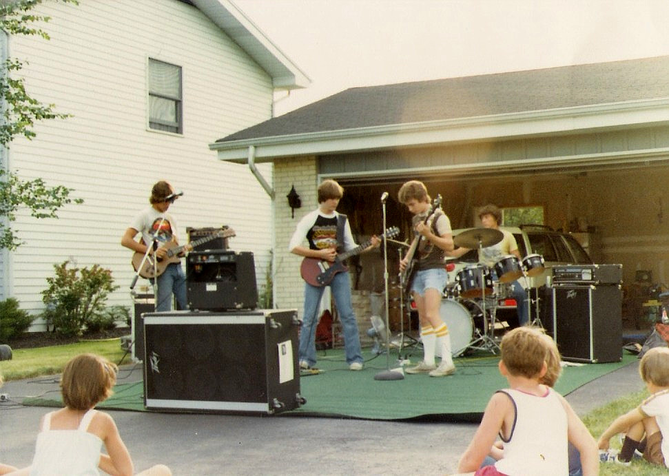 SS at 14 playing a local block party, center on red Gibson still owns